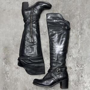 Black leather grunge biker Frye knee high boots with silver buckle detailing